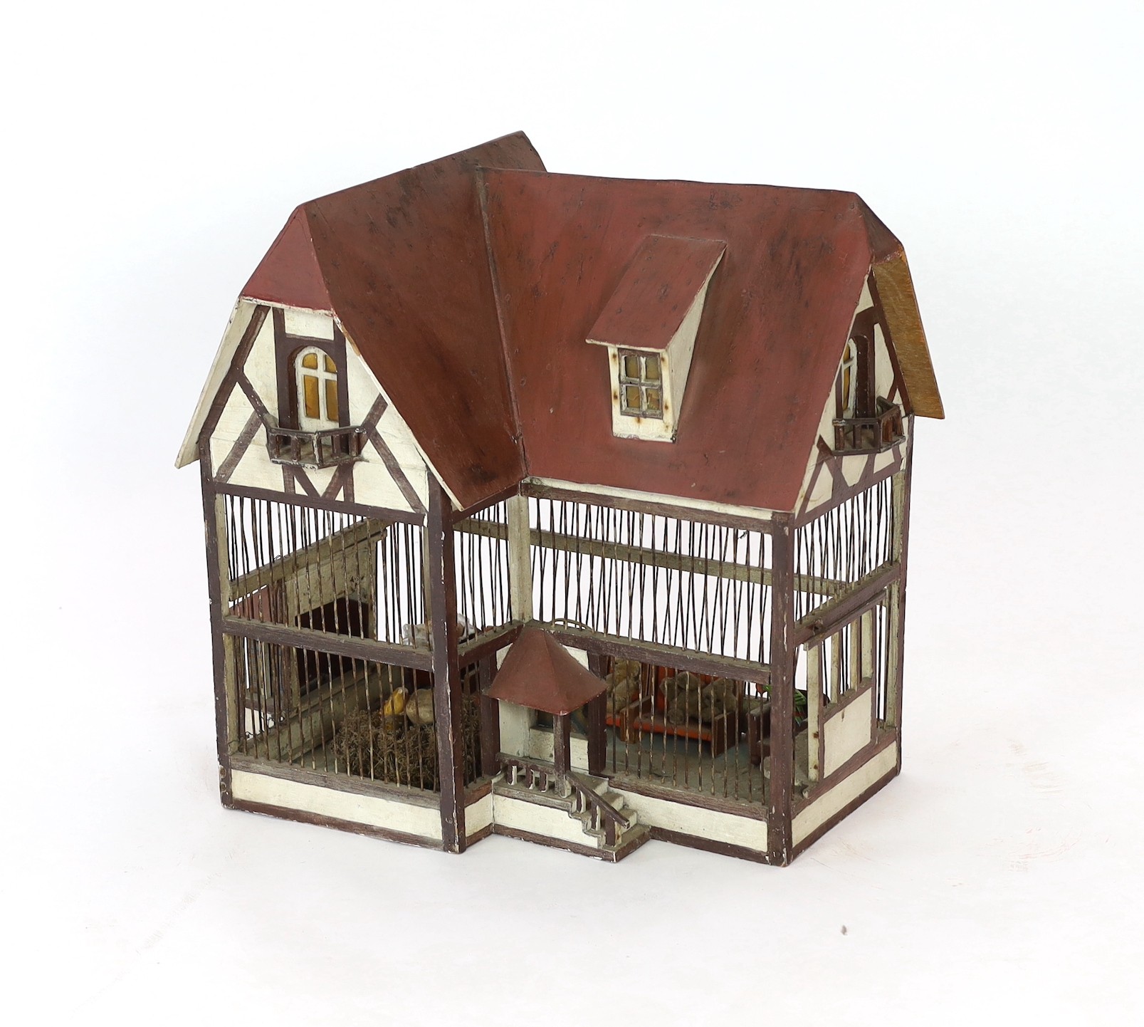 A German ‘birdcage’ dolls’ house, late 19th century, 56cm high
